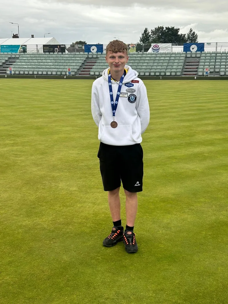 Kyle Malcolmson with his International Silver and National Bronze medals
