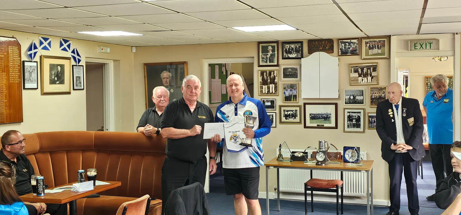 Club President Alex Brown accepting the City of Stirling Top Fifteen Trophy – 2025