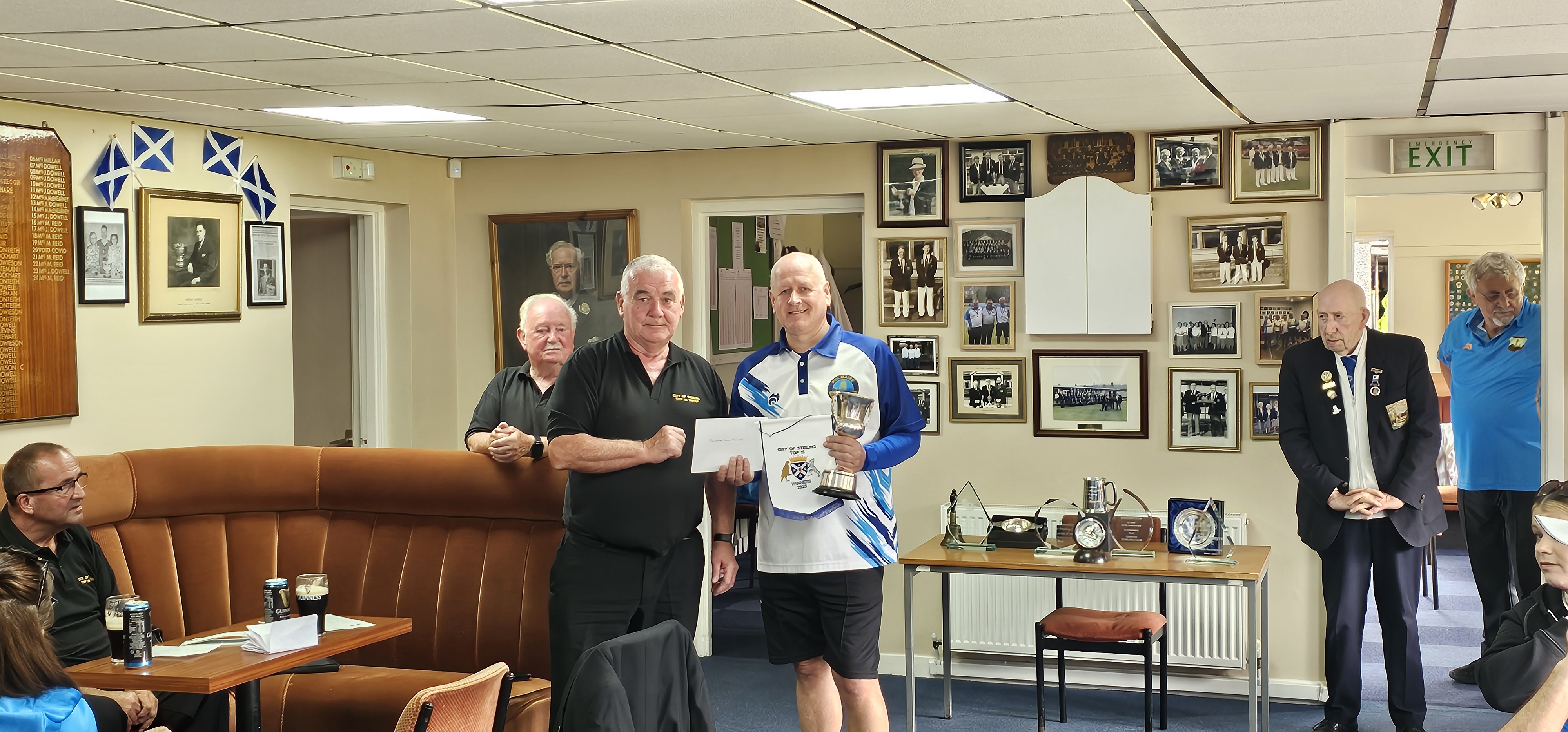 Club President Alex Brown accepting the City of Stirling Top Fifteen Trophy – 2025