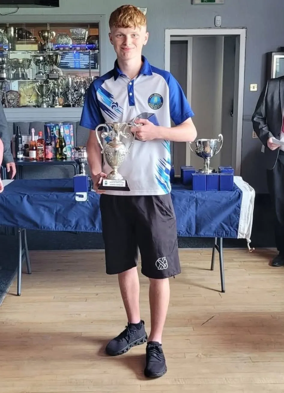 Kyle Malcomson of Polmaise Bowling Club pictured with the Under 25s Singles trophy after winning the Stirling County Association Final at Burnhead Bowling Club.