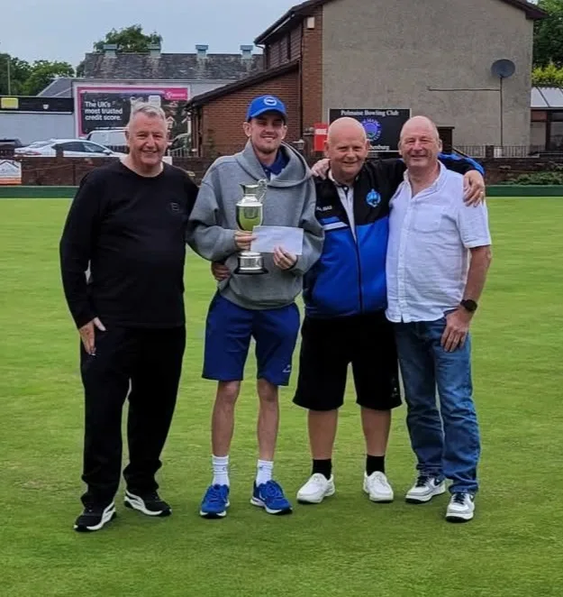 President David Stewart and John Ryan, Greg's father, present the Greig Ryan Pairs trophy to 2026 champions Aaron Furzer and Sandy Deans