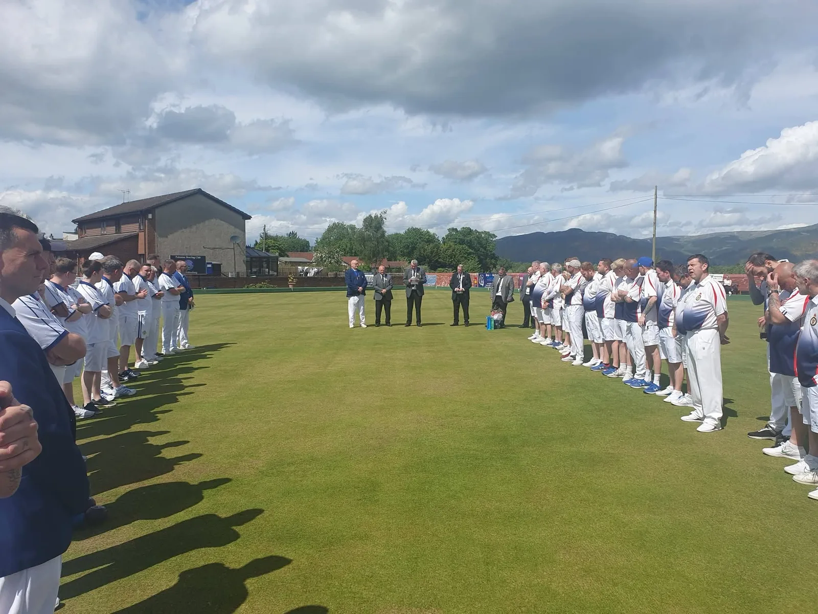 Guard of honour for Sandy Deans on the green at Polmaise Bowling Club