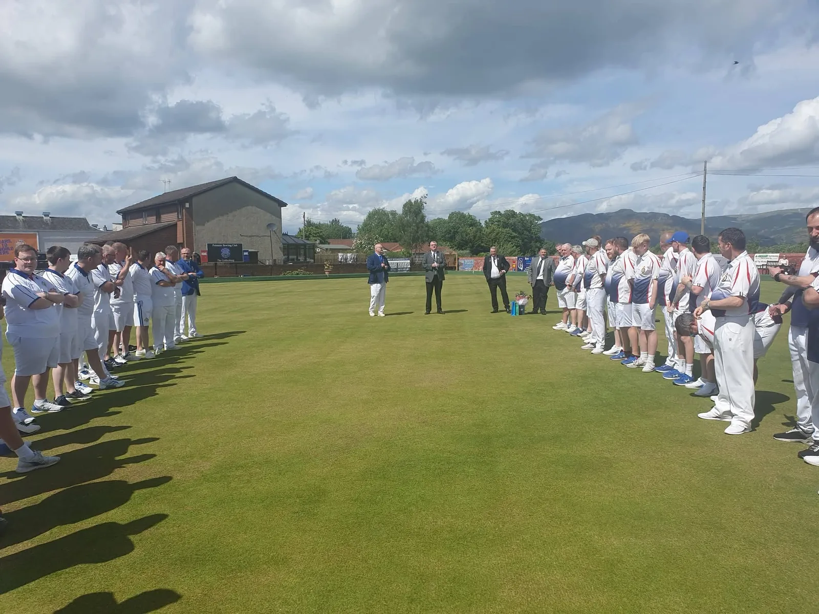 Sandy Deans receives a guard of honour from fellow bowlers at Polmaise Bowling Club