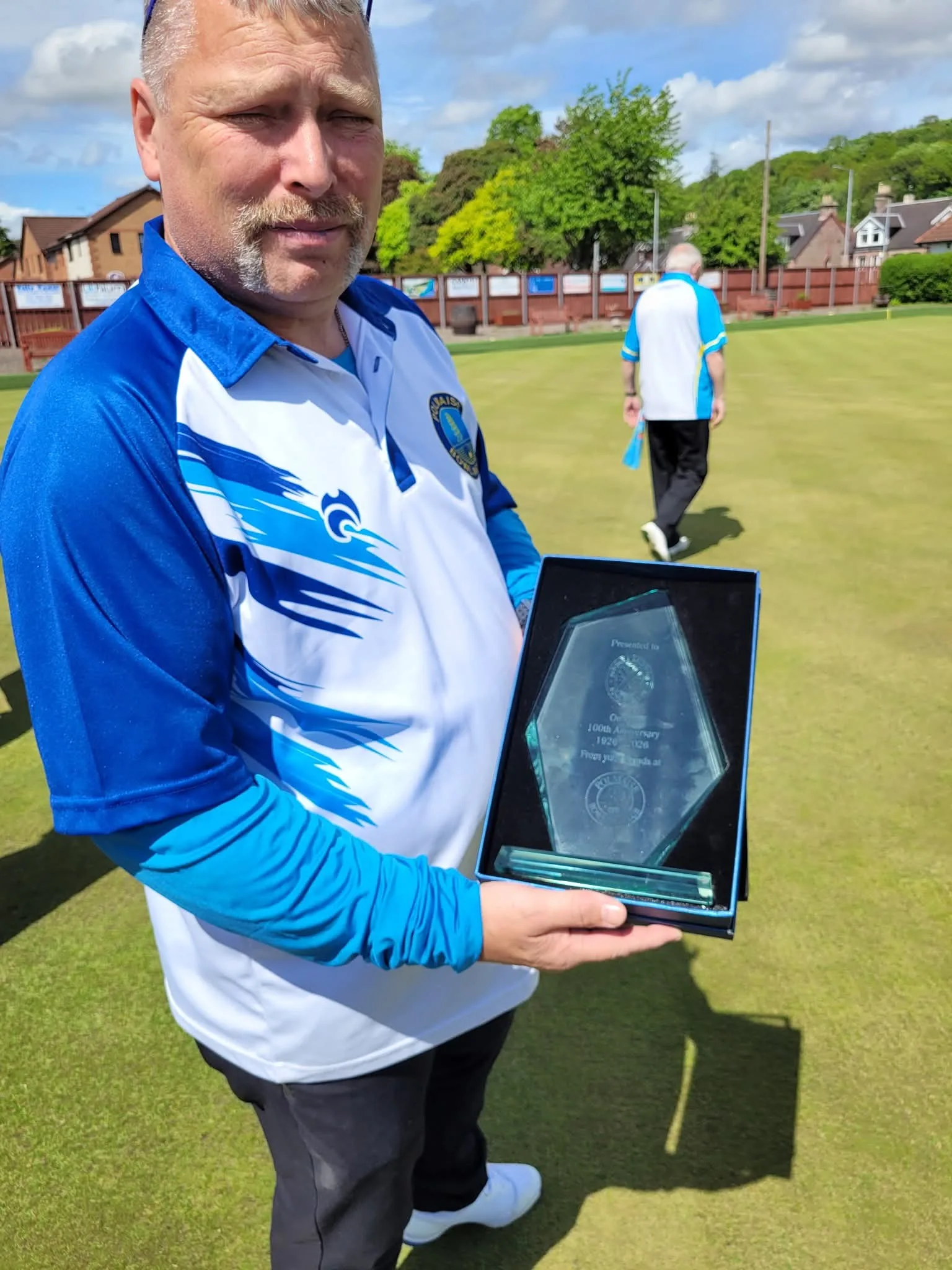 Commemorative centenary plaque presented by Polmaise Bowling Club